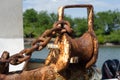 Rusty anchor roller and chain Royalty Free Stock Photo