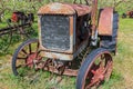 A rusty antique McCormick-Deering tractor