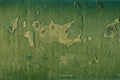 Rusty background. Old metal plate with cracked green gloss paint Royalty Free Stock Photo