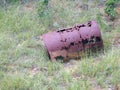 Rusted Out Barrel with bullet Holes Royalty Free Stock Photo