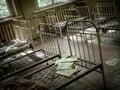 Rusty beds in abandoned Kindergarten in Pripyat, Chernobyl