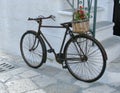 A rusty bicycle in the white city Ostuni in Italy