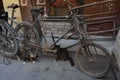 Rusty bicycles in a busy street in the old town of Mombasa