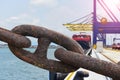 The rusty big anchor chain of the heavy cargo winch A large cargo ship. Royalty Free Stock Photo