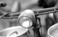 Rusty bike of a milkman with the front lights of the last centu Royalty Free Stock Photo