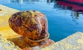 Rusty bitt in harbor Royalty Free Stock Photo