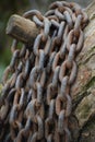 Rusty Boat chain on a Jetty Royalty Free Stock Photo