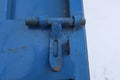 Rusty Bolt Lock In A Blue Metal Door