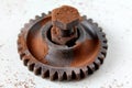 Rusty bolt, nut and gear wheel made of chocolate isolated on white background Royalty Free Stock Photo