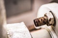Rusty bolt and nut of water heater pipe Royalty Free Stock Photo
