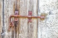 rusty bolt of old country door Royalty Free Stock Photo