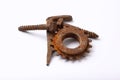 Rusty bolts and cogwheel