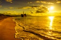 Rusty broken shipwreck on sea shore