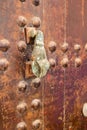 Rusty bronze hand door knock