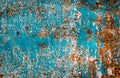 Rusty brown iron texture, blue old fence with peeling paint. Textured wallpaper for design Royalty Free Stock Photo