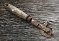 Rusty can opener with wood handle Royalty Free Stock Photo