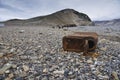 Rusty canister on the beach