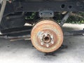 Rusty car axle without wheel