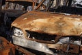 rusty car that burned at a scrapyard Royalty Free Stock Photo