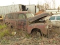 Rusty Car in Scrap Metal Yard Royalty Free Stock Photo