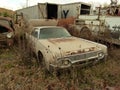 Rusty Car in Scrap Metal Yard Royalty Free Stock Photo