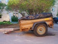 Rusty car trailer with two wheel axle Royalty Free Stock Photo