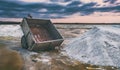 Rusty cart on a salt lake Royalty Free Stock Photo