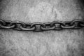 Rusty chain on floor Royalty Free Stock Photo