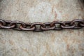 Rusty chain on floor Royalty Free Stock Photo