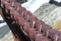 Rusty chain links aged by time, highlighting beauty and texture Royalty Free Stock Photo