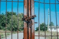 Rusty chain on a metal gate Royalty Free Stock Photo