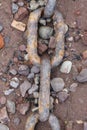 Rusty Chain on Pebble Beach Royalty Free Stock Photo