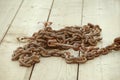 Rusty Chain on Wooden Deck