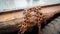 Rusty chains at the harbor Royalty Free Stock Photo