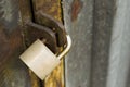 Rusty closed padlock on door Royalty Free Stock Photo