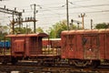 A rusty coloured Indian goods train guards compartment tied with goods train Royalty Free Stock Photo