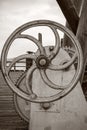 Rusty controlling faucet crane. Round handle of water supply valve close-up Royalty Free Stock Photo