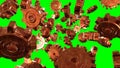 Rusty copper gears on green chroma key background.