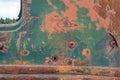 Rusty corroded details on an antique car door Royalty Free Stock Photo