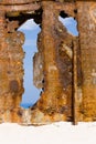 Rusty, corroded iron wreck. Old abandoned ship detail in Zakynthos, Greece. Royalty Free Stock Photo