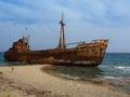 Rusty corroding Dimitrios shipwreck on a sandy beach near Gythio, Greece