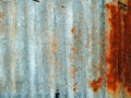 A rusty corrugated iron metal fence Royalty Free Stock Photo