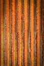 Rusty corrugated iron metal fence Zinc wall textur Royalty Free Stock Photo