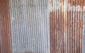 Rusty corrugated metal tin, aluminium, iron, steel plates with beautiful color show vertical line texture with fringe and Royalty Free Stock Photo