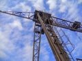 Rusty crane bridge type on the background of sky Royalty Free Stock Photo