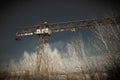Rusty crane on rails