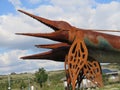 Rusty crocodile sculpture