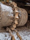 Rusty details of old abandoned tracked tractor. Gears, chains