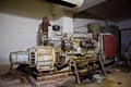 Rusty diesel generator in an abandoned Soviet bomb shelter
