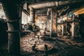 Rusty and dirty heavy machinery in an abandoned factory